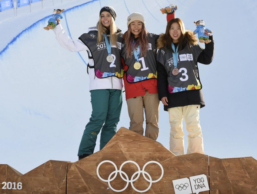 (Photo courtesy of Lillehammer 2016 Youth Olympic Games (CC BY-NC 2.0)) Chloe Kim (center) poses with other medal winners in the Ladies Snowboard Halfpipe Finals at Oslo Vinterpark Halfpipe during the Winter Youth Olympic Games, Lillehammer, Norway, 14 February 2016.