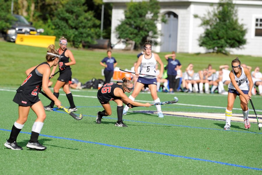 (Photo courtesy of Lisa Manuzza Photography) Freshman Halle Aschenbach moves the ball in a game this past fall. 