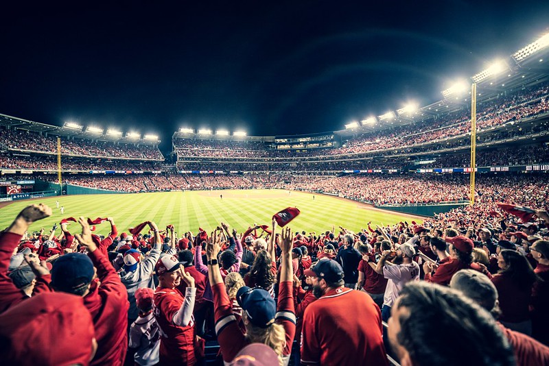 The Washington Nationals crowd waves their team towels in support.