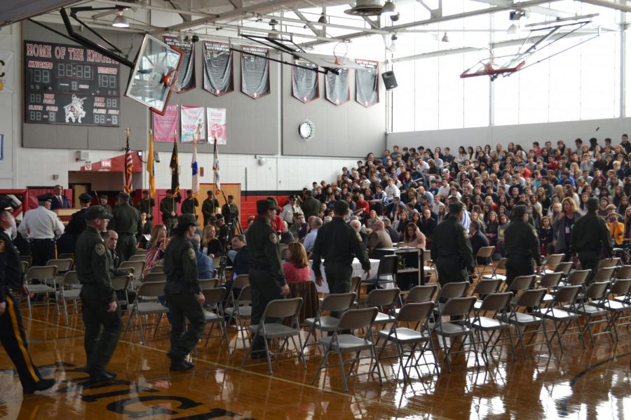 Student body gathers in gymnasium to honor Veterans.