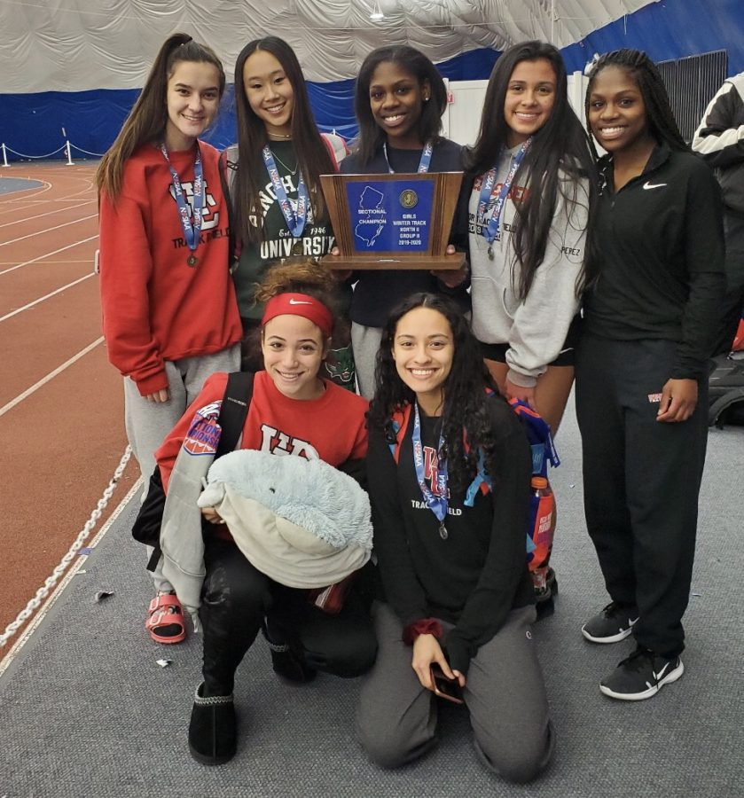 (Photo courtesy of Lanaya Torres) The West Essex Girls track team celebrates after their North II Group II title win on Feb. 14. Winter track and field has had a storybook 2019-2020 season despite the challenges the winter season brings. 
