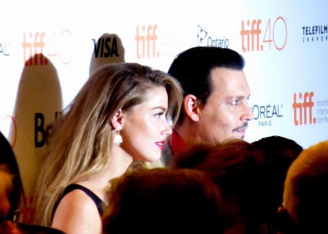 Amber Heard and Johnny Depp captured at the premiere of Black Mass.