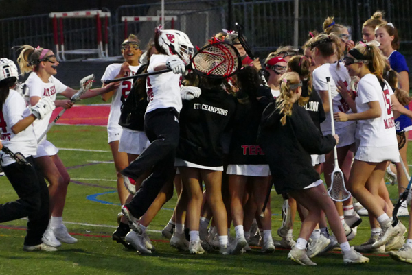 Girls lacrosse celebrates a second straight county championship on May 10. 