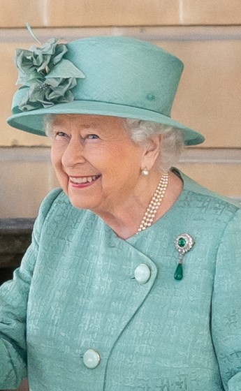 Queen Elizabeth II, in June of 2019, welcoming visitors into Buckingham Palace. A remembrance of Queen Elizabeth, and how her legacy will be spread across the globe.  