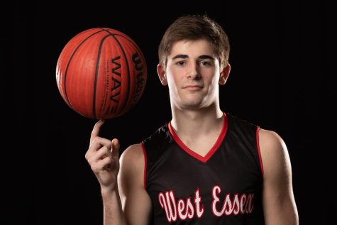 Senior Joe Ganton marked his 1,000 high school career point in basketball on Jan. 31.