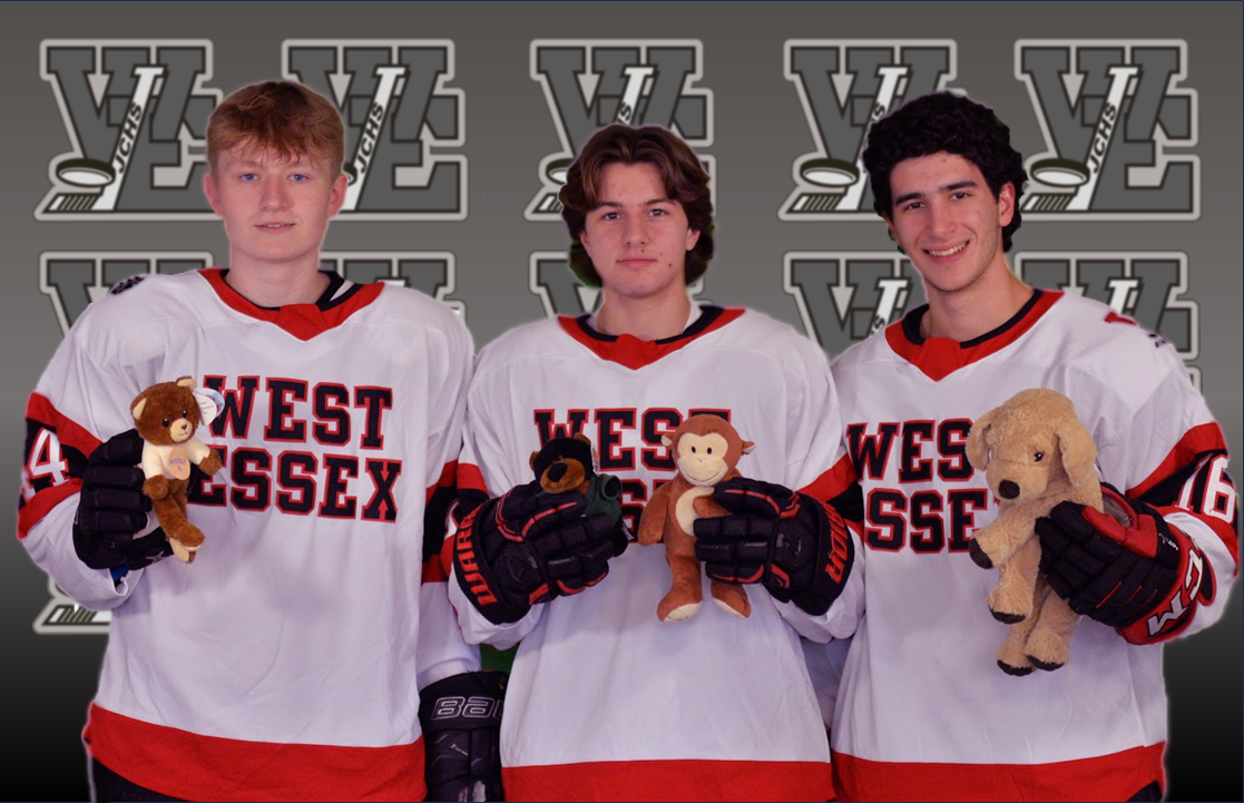 (From left) Seniors Jacob Zak, Michael Quinn and Luca Infusino are part of the Ice Hockey teams Teddy Bear Toss--a toy drive running Dec. 22.