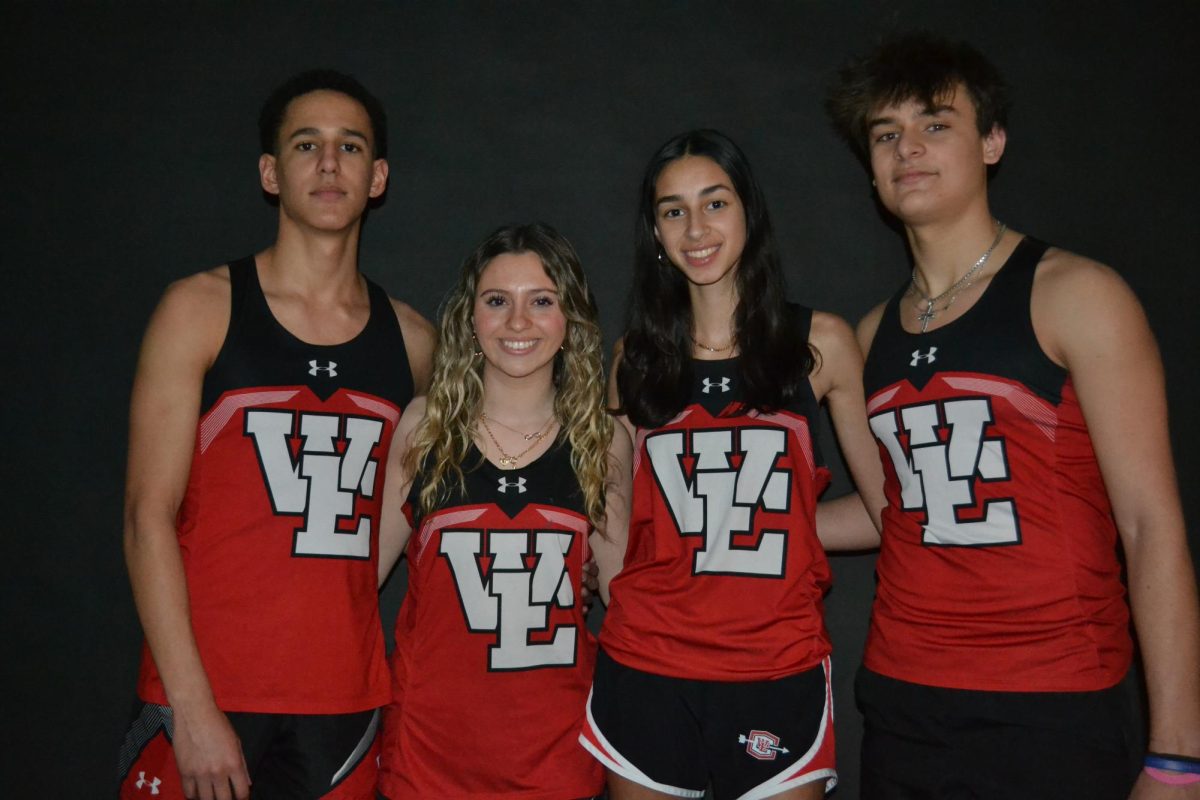 Captains Devin Fogg (left), Emma Sceppaguercio (middle left), Asha Rastogi (middle right) and Aaron Blanco lead the Boys and Girls Winter Track teams to success