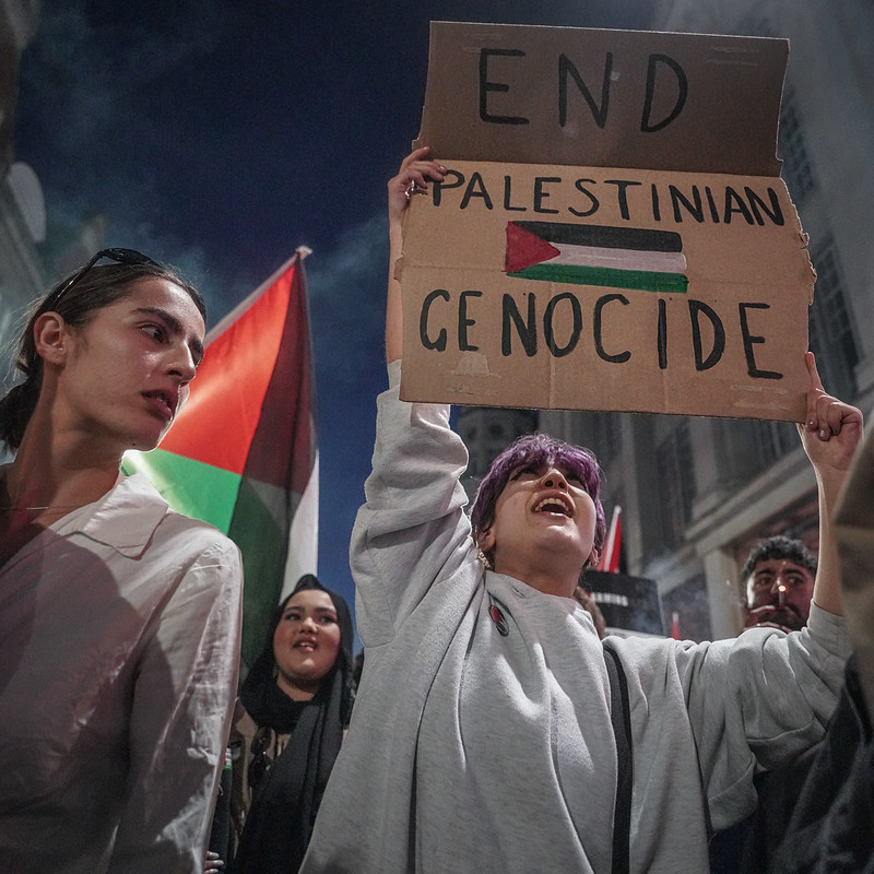 Protesters+are+holding+signs+accusing+Israel+of+genocide+contributing+to+the+debate+on+whether+Israel+is+commiting+genocide.+