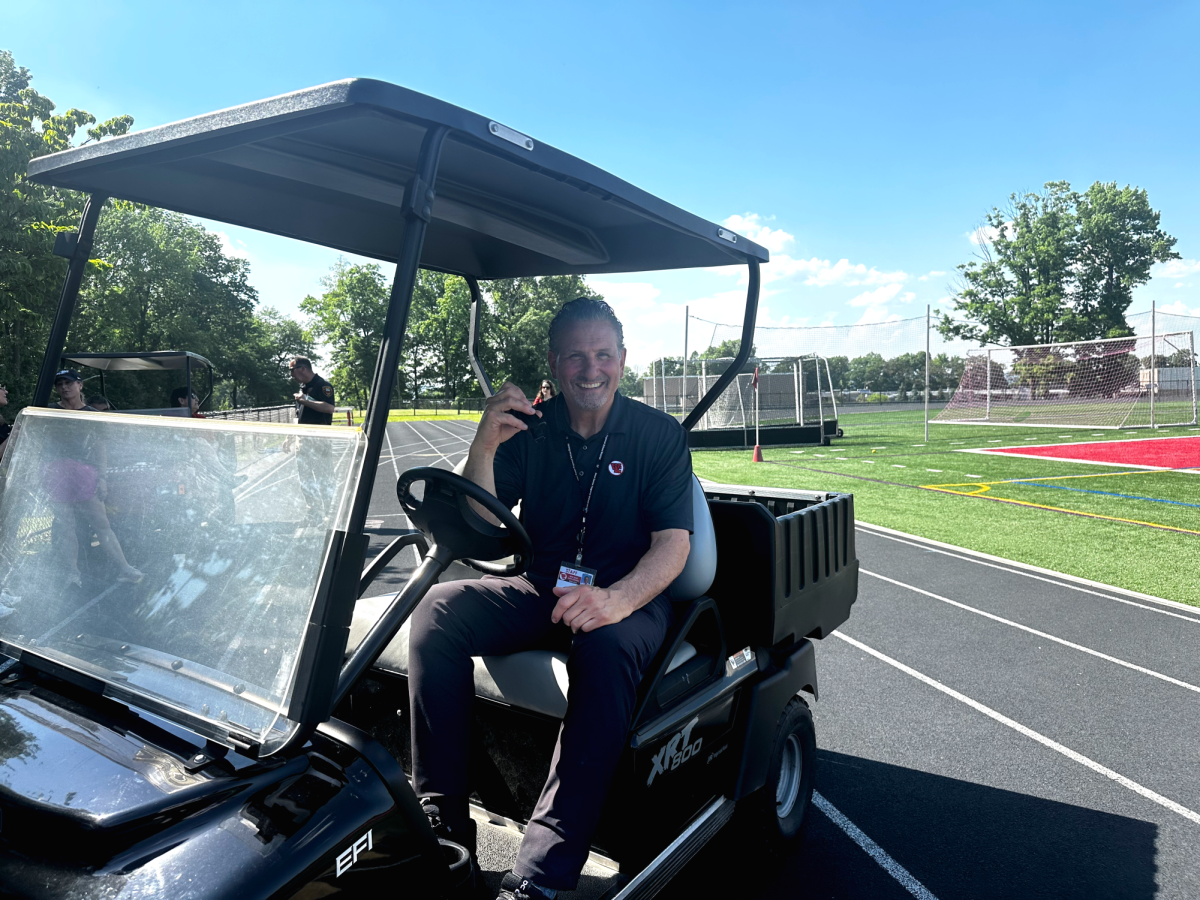 Athletic Director Anthony Minnella makes trips around the West Essex campus to support sports activities.