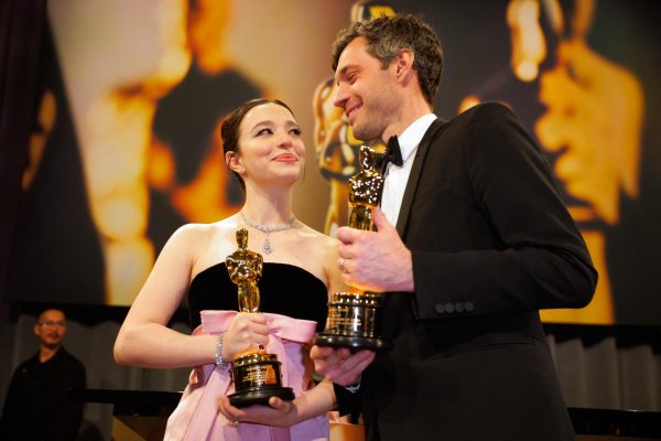 Mikey Madison holds the Oscar for the Best Actress for "Anora" and  producer Alex Coco  pose with the Oscar for Best Picture for "Anora" at the Governors Ball following the Oscars show at the 97th Academy Awards in Hollywood, Los Angeles, California, U.S., March 2, 2025. REUTERS/Mike Blake