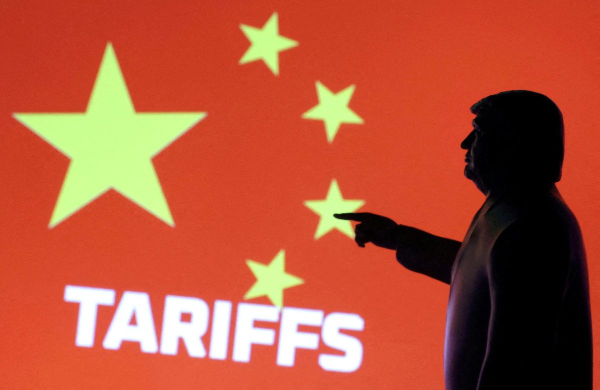 A 3D-printed miniature model depicting U.S. President Donald Trump, Chinese flag and word "Tariffs" in this illustration taken,  April 17, 2025. REUTERS/Dado Ruvic/Illustration