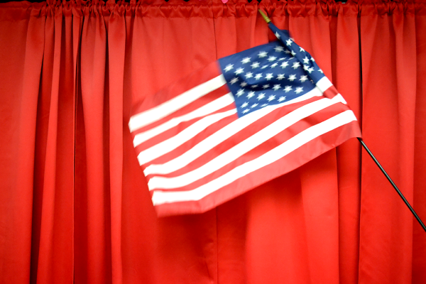 A waving American flag one of the core symbols of American patriotism.