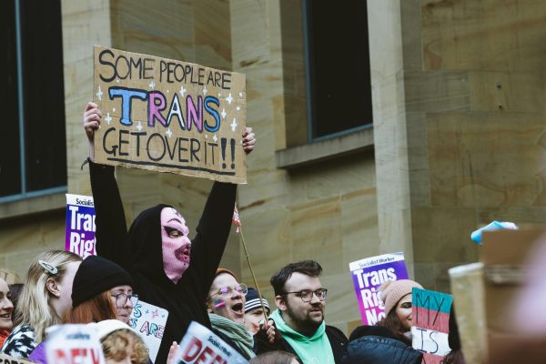 Hundreds rally to protest against anti-trans legislation. 