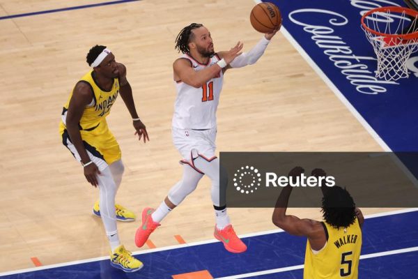 May 29, 2025; New York, New York, USA; New York Knicks guard Jalen Brunson (11) shoots against Indiana Pacers forward Pascal Siakam (43) and forward Jarace Walker (5) in the second quarter during game five of the eastern conference finals for the 2025 NBA Playoffs at Madison Square Garden. Mandatory Credit: Brad Penner-Imagn Images