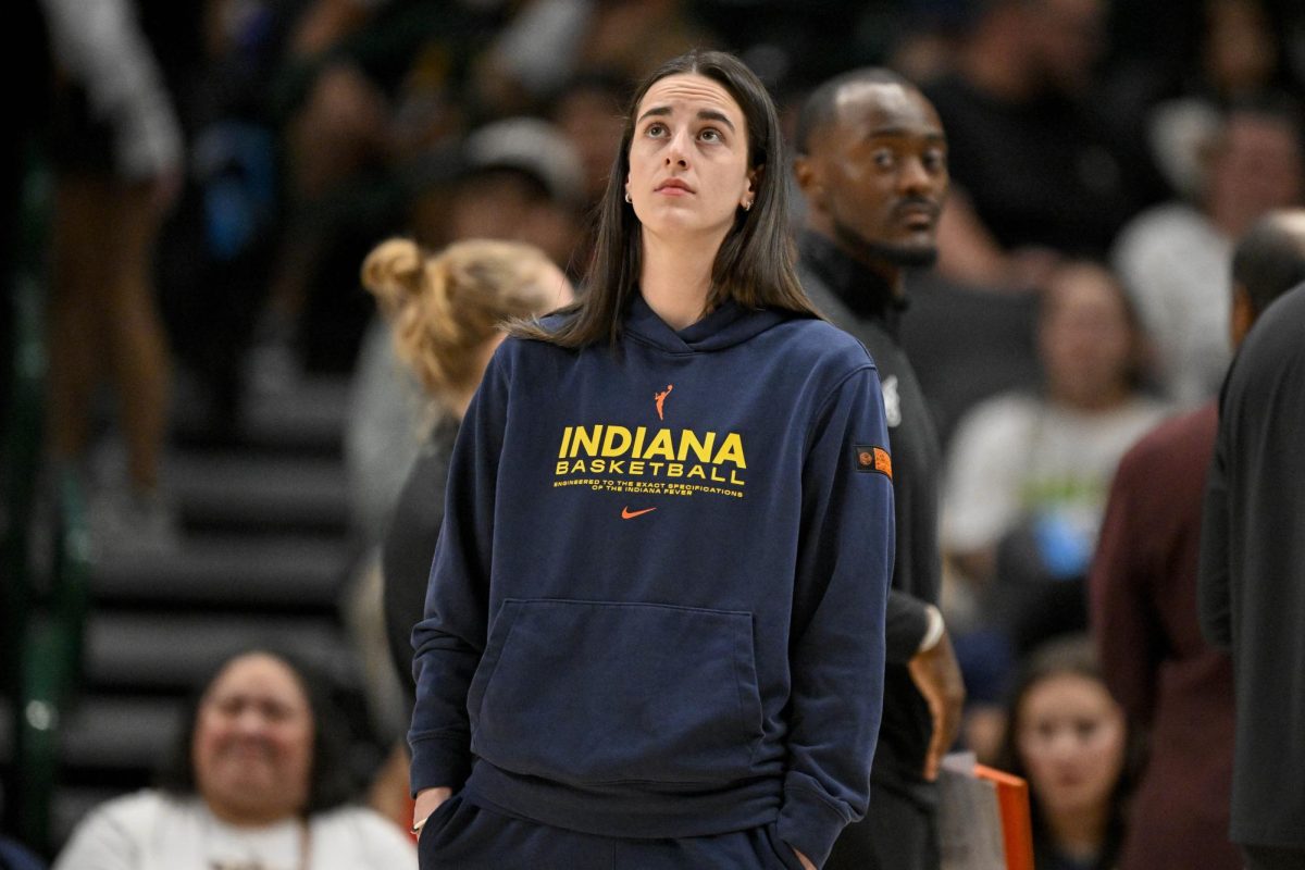 Indiana Fever guard Caitlin Clark (22) looks on during the game between the Dallas Wings and the Indiana Fever at the American Airlines Center on Aug. 1 in Dallas, Mandatory Credit: Jerome Miron-Imagn Images