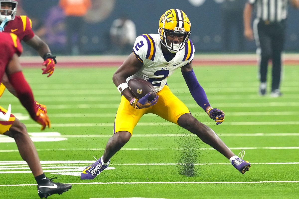 LSU Tigers wide receiver Kyren Lacy (2) runs with the ball against the Southern California Trojans. Mandatory Credit: Stephen R. Sylvanie-USA TODAY Sports
