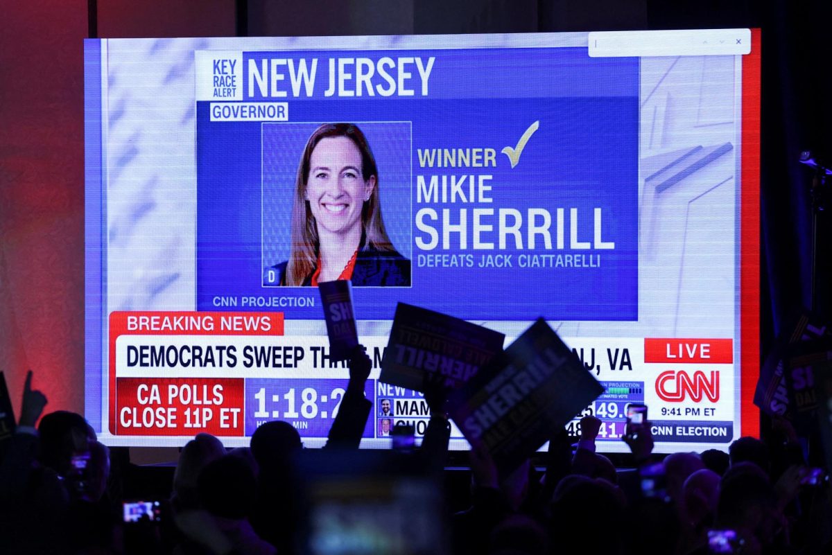 Supporters of U.S. Representative Mikie Sherrill, Democratic gubernatorial candidate for New Jersey, cheer at her election night rally after U.S. media projected that she won, in East Brunswick, New Jersey, U.S., November 4, 2025. REUTERS/Mike Segar