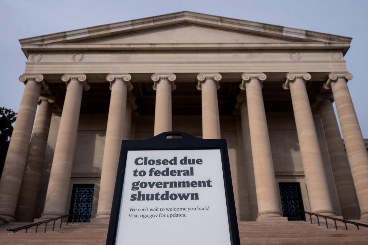 Signage warning of closures due to the U.S. Government shutdown in front of the National Gallery of Art, in Washington, D.C., U.S., November 7, 2025. REUTERS/Nathan Howard