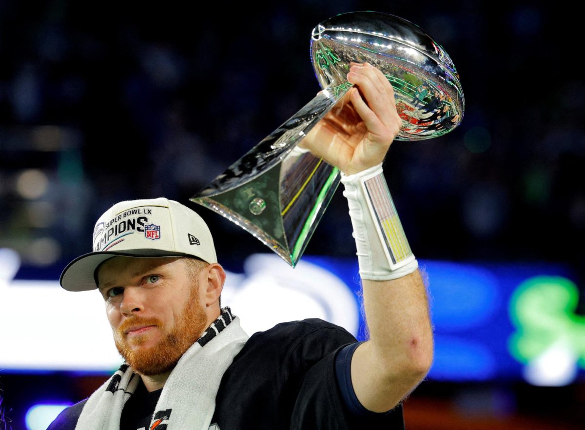 Football - NFL - Super Bowl LX - New England Patriots v Seattle Seahawks - Levi's Stadium, Santa Clara, California, United States - February 8, 2026 Seattle Seahawks' Sam Darnold celebrates with the Vince Lombardi Trophy after winning Super Bowl LX REUTERS/Mike Blake