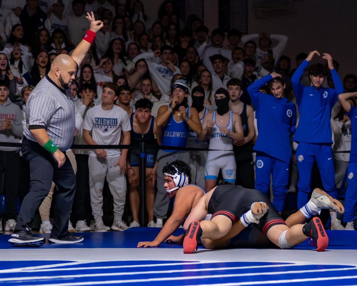 Knights wrestling defeats Caldwell in Friday night battle. 
