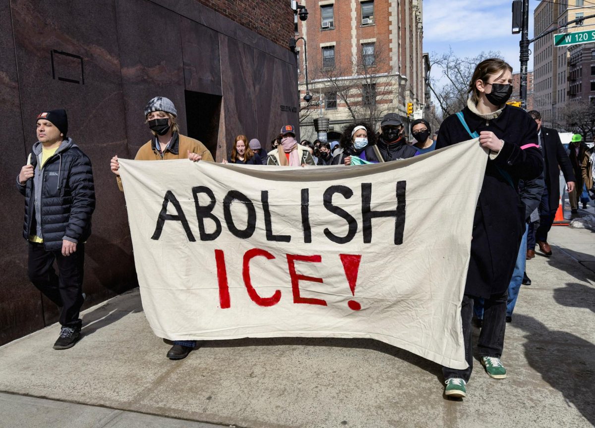 People take part in a protest outside the Columbia University campus after agents from the U.S. Department of Homeland Security (DHS) detained a student in university housing, in New York City, U.S., February 26, 2026. REUTERS/Roselle Chen