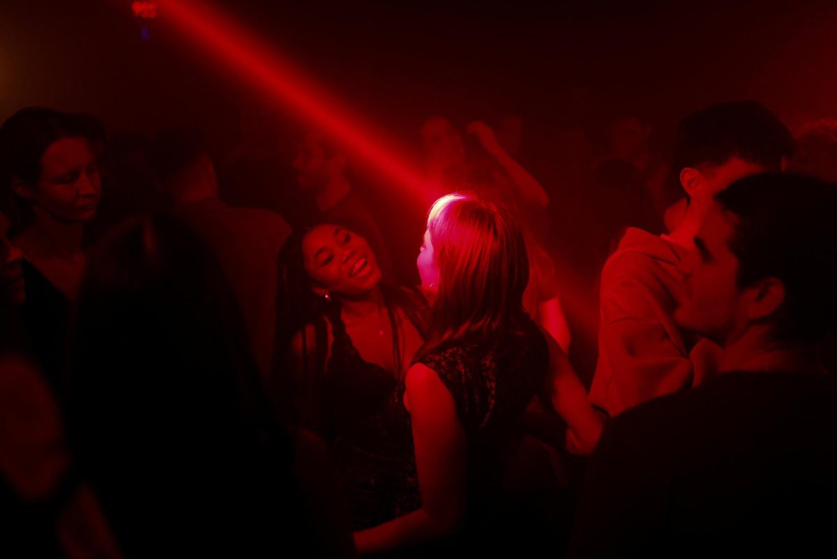 People dance on the dancefloor at The Carpet Shop nightclub in Peckham in London, Britain, November 15, 2025. REUTERS/Jack Taylor