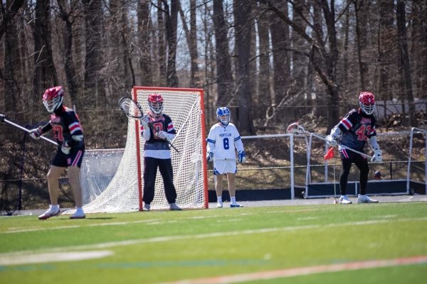 Senior Teddy Skopak guards the Lacrosse Knights goal against Montclair on March 4. Skopak broke the school record for lacrosse saves with 770.