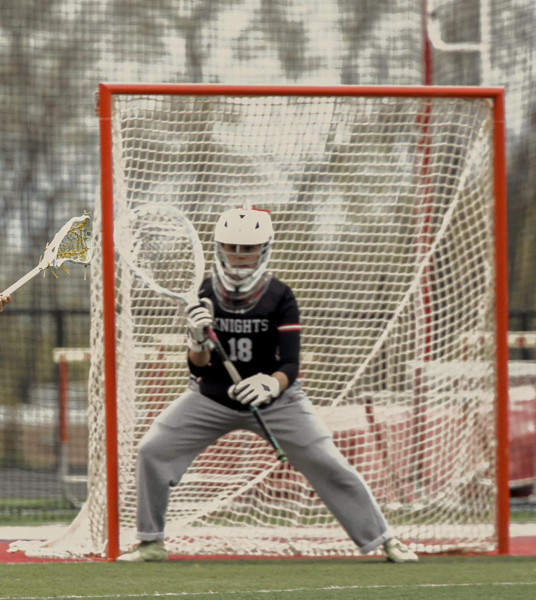 Maddy Schlosser in goal ready to save a shot. In just her second year on the team, Schlosser saved 412 goals to end her senior season.