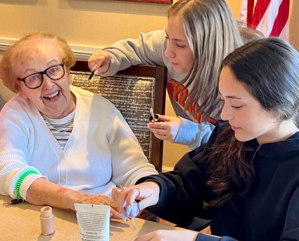 Members of the new GlamourGals club at West Essex met with seniors at Sunrise Retirement Community in Fairfield for makeovers, crafts and conversation in late March.  (Photo courtesy of @WEGlamourGals/Instagram)